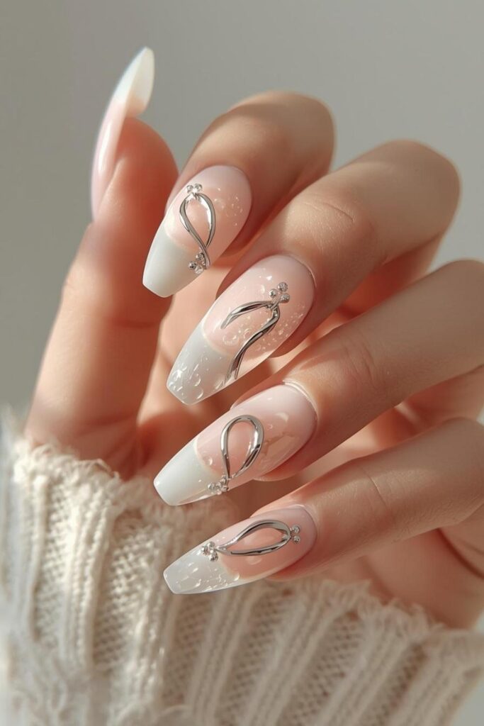 Soft white French cute acrylic nail designs with elegant twisted chrome tips on almond nails