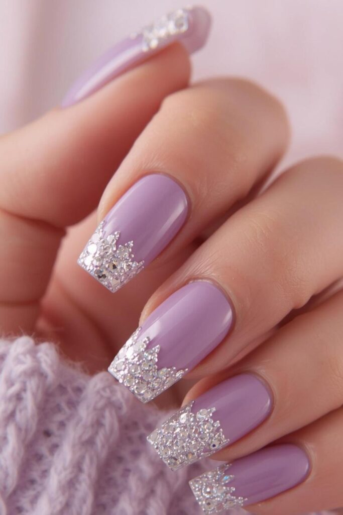Dusty lavender coffin acrylic nails finished with reflective silver chrome French tips for a modern Trendy Acrylic Nails 2026 style.