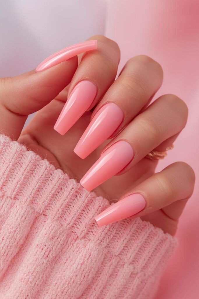 Glossy strawberry milk coffin acrylic nails with a soft translucent pink finish representing a popular Trendy Acrylic Nails 2026 look.