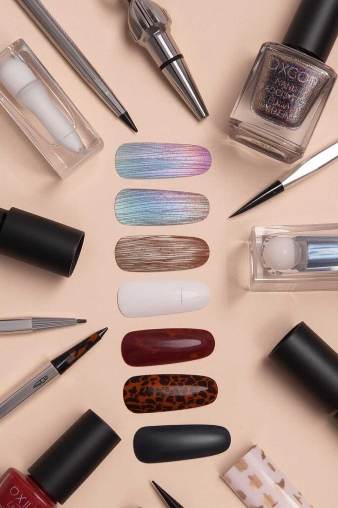 Flat lay of Trendy Acrylic Nails 2026 featuring chrome, velvet matte, glazed finishes, micro French nails, and luxury manicure tools.