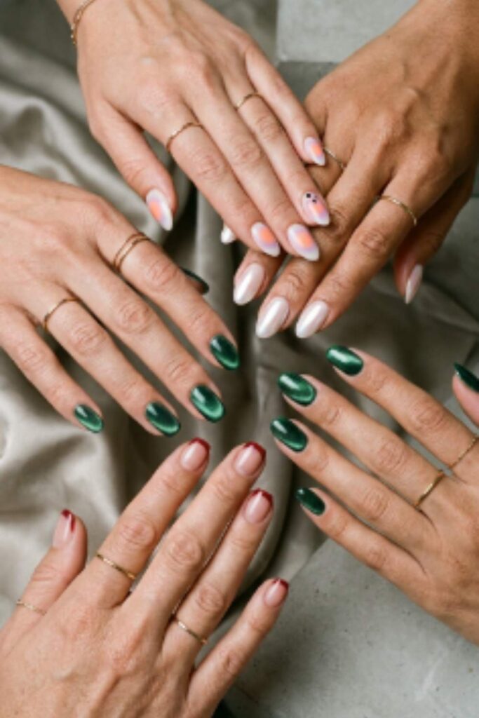 Modern 2026 nail trends featuring velvet nails, cat-eye polish, chrome finishes, aura nails, jelly nails, and elegant Red French Tip Nails.