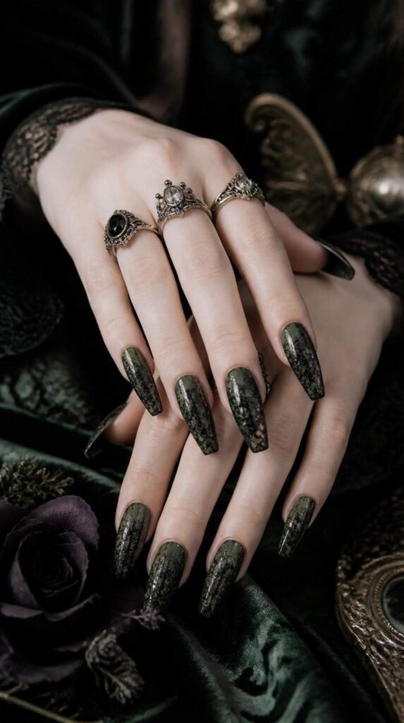 Forest green coffin gothic acrylic nail designs featuring elegant black lace nail art.