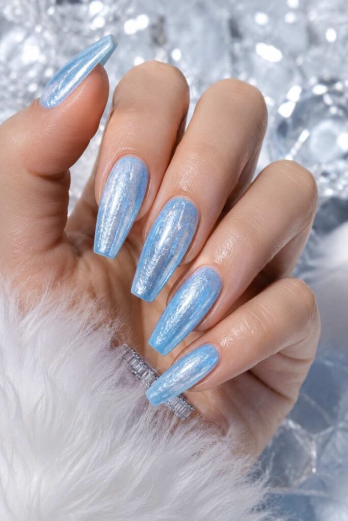 Ice blue coffin long acrylic nail inspo with frosted metallic sheen.