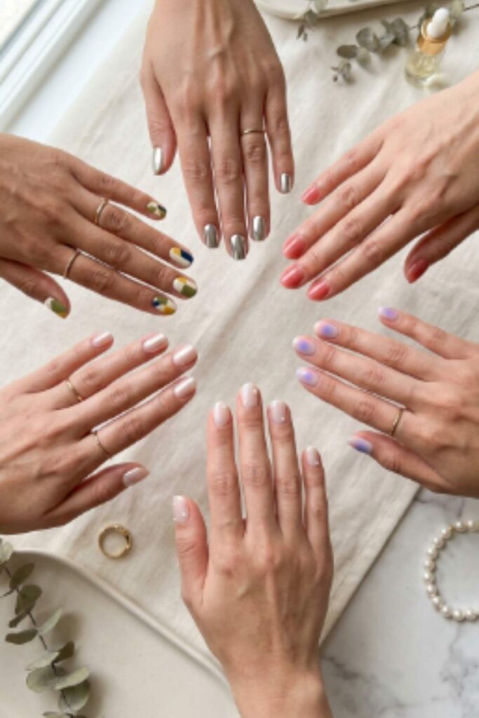 Editorial display of trending Short Nail Designs featuring chrome, jelly, aura, pearl, glazed, and color-block nail styles for Summer 2026.